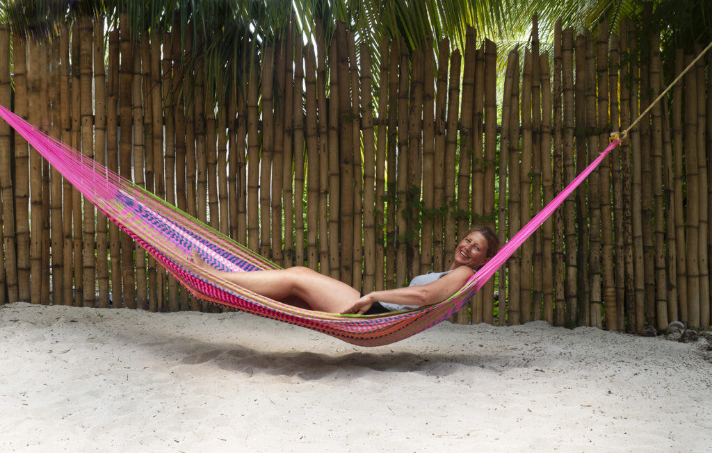 Relaxing in a colourful hammock